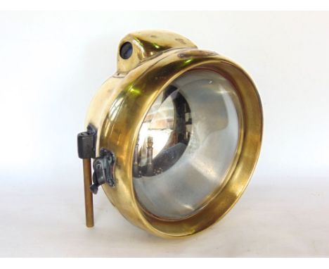 A good antique brass cased carbide lamp with plaque inscribed 'Powell & Hanmer Limited, Manufacturers Birmingham', 31 cm high