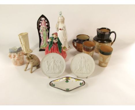 A collection of Doulton wares comprising a figure of Lady Charmian HN1949, a stoneware jug with relief moulded decoration and