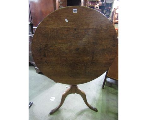 A Georgian snaptop table on turned pillar and tripod.