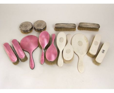Five piece silver and guilloche enamel dressing set to include and mirror and four brushes; together with four further silver