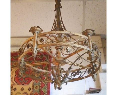 CHANDELIER, early 20th century gilt iron of five lights with ropetwist and rosette detail, 91cm H x 61cm W. 