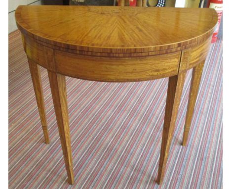 DEMI LUNE CARD TABLE, George III style satinwood, tulipwood crossbanded and line inlaid with green baize foldover top, 76cm H