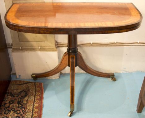 METAMORPHIC CARD TABLE, George III mahogany and satinwood banded D shaped foldover with rare articulated triform support, 74c