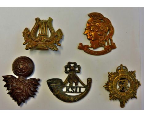 Cap badges (5) including: Royal Army Service Corps, Artists Rifles, Royal Fusiliers etc. (Back fittings mostly missing, sold 