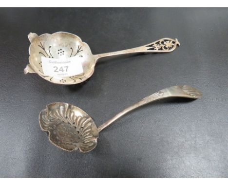 A HALLMARKED SILVER SIFTER LADLE TOGETHER WITH A SILVER PLATED EXAMPLE (2)