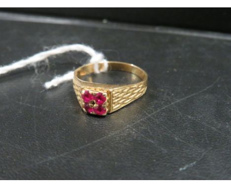 A FOUR STONE RUBY STYLE RING STAMPED 18CT - APPROX WEIGHT 3.5  G