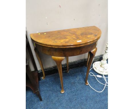 A 20TH CENTURY FOLD-OVER WALNUT DEMI-LUNE CARD TABLE DIA. 84 CM