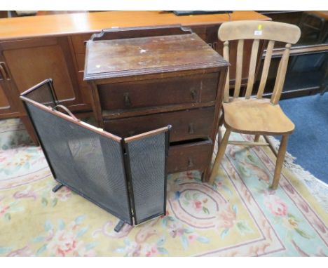A VINTAGE OAK THREE DRAWER CHEST, FIRESCREEN AND KITCHEN CHAIR