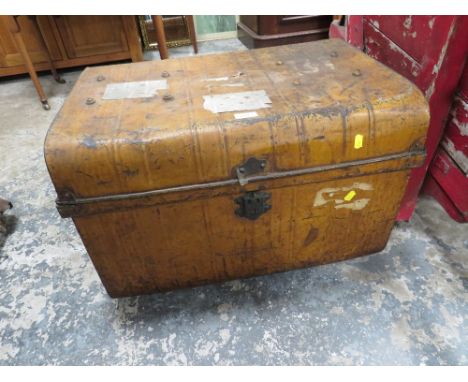 A VINTAGE TIN TRUNK