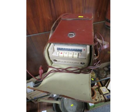 A VINTAGE LEATHER CASED GRUNDIG McMARETTTE RADIO WITH SPEAKER