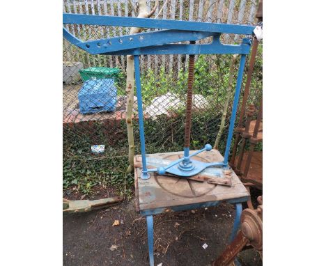 A LARGE VINTAGE BLUE CHEESE PRESS