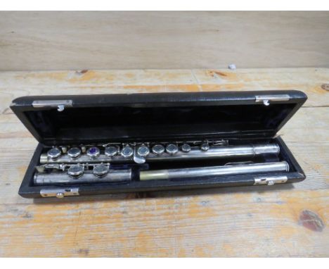 A CASED BUFFET CRAMPON FLUTE MARKED 'E'
