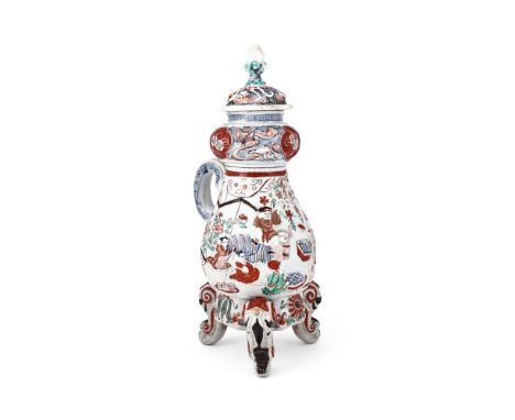 An Japanese Imari Coffee Pot and Cover, Edo period, late 17th century, of typical form and moulded with Daikoku, Ebisu and Ho