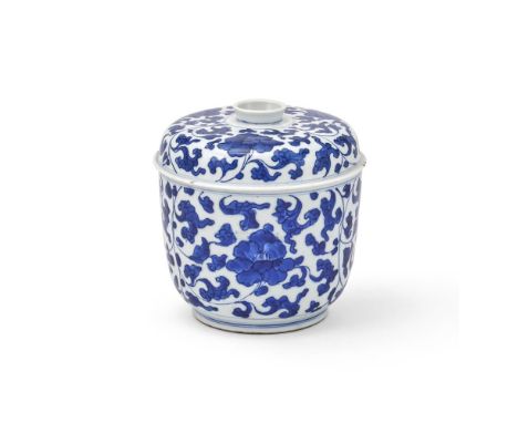 A Chinese blue and white bowl and cover, Kangxi, painted in vivid blue with scrolling foliage, 15cm high 清康熙 青花花卉紋蓋碗  Conditi