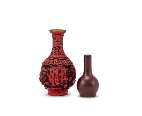 A Chinese brown glazed miniature bottle vase, 18th century, 6.8cm high; and a Chinese cinnabar bottle vase, 10.2cm high (2)清中