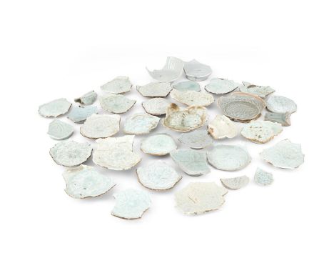 A study group of thirty-three Chinese Qingbai shards, Song dynasty, most with various incised or moulded and carved floral de