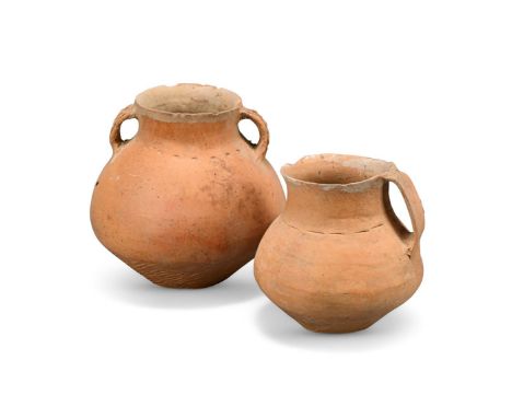 Two Chinese Neolithic twin handled jars, Qijia Culture, circa 2050-1700 BC, the largest jar 18cm high (2)Provenance: From the