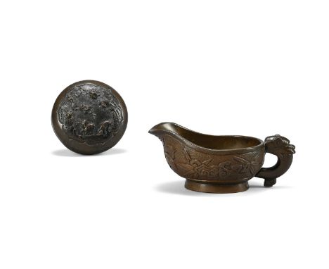 A Chinese bronze seal paste box and cover, 17th or 18th century, the base inscribed with an apocryphal xuande mark, 6cm diame