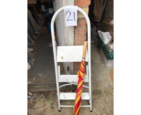 Folding step ladder and umbrella. 