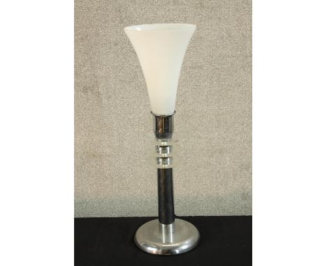 A contemporary chrome table lamp with conical shaped frosted glass light shade. H.58cm. 