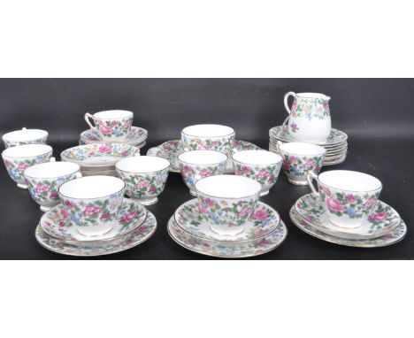 Crown Staffordshire fine bone china tea service. The service comprising of cups, saucers, side plates, serving plate, sugar b