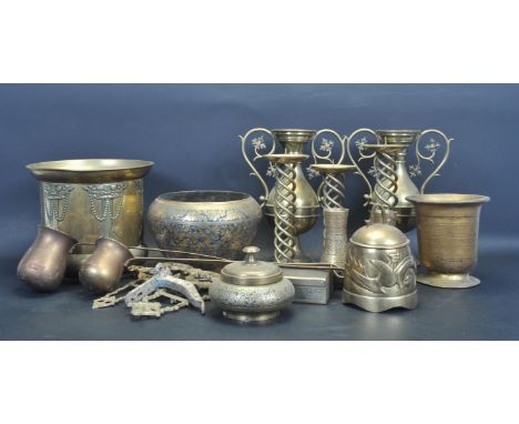 A large collection of early 20th century and later brass ware to include vases, plater, candlesticks, lidded boxes, miniature
