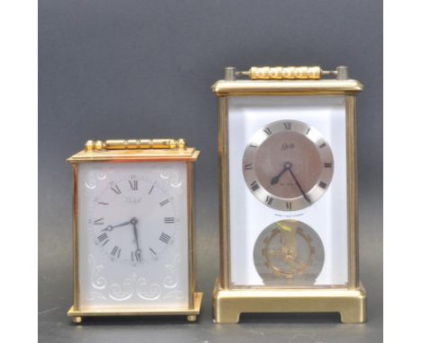 Two vintage 20th century carriage clocks comprising of a Schatz brass cased clock having Roman numerals to the chapter ring t