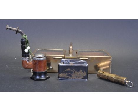 A collection of vintage retro 20th century smokers items / collectors items to include brass lidded cigarette box of a rectan