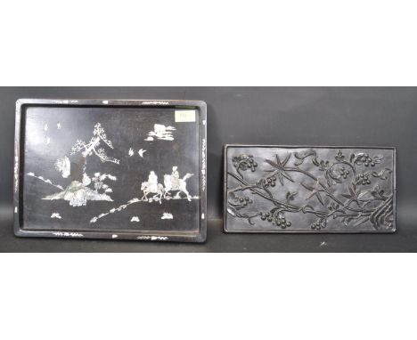 A 19th century Chinese oriental hand carved hardwood panel having floral embossed motifs together with a Chinese oriental ebo