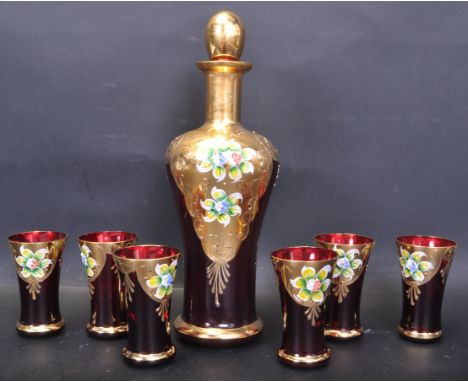 A vintage retro mid 20th century Murano Glass Tre Fuochi&nbsp;decanter and six glasses. The decanter having gold leaf to the 