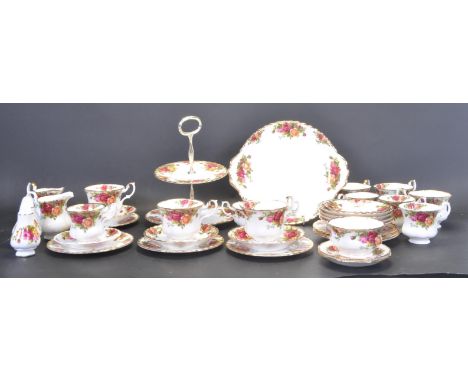 A 20th century Royal Albert Old County Roses bone china tea service comprising of small tea cups, large tea cups, saucers of 