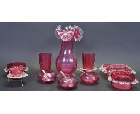 A collection of 19th century Victorian ruby / cranberry glass to include vases, beakers, jugs, condiment pots etc. Collection