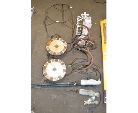 Quantity of outside garden ornaments to include a pair of bicycle pot stands, wrought iron pot stand, cast lighthouse, plant 