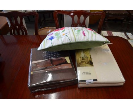 A quantity of textiles to include embroidered duvet set, new and in packaging, King Size, cream lined curtains, new and unope