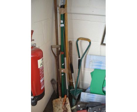 Quantity of assorted gardening tools to include shovels, rakes, pick axe etc