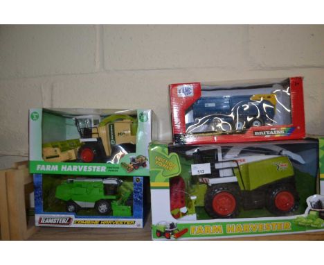 Four boxed large scale agricultural models including Britains