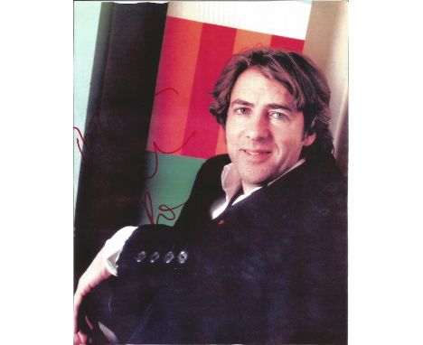 Johnathan Ross signed 10 x 8 colour portrait photo. Dedicated. Good Condition. All autographs come with a Certificate of Auth