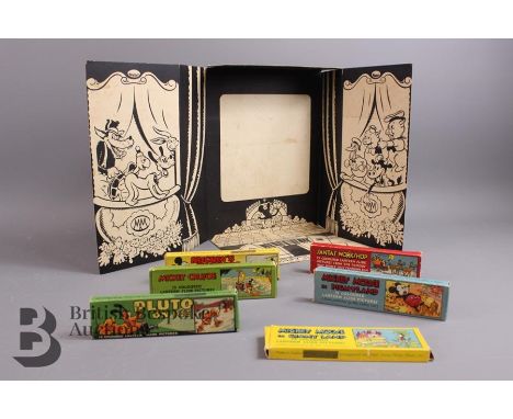 Walt Disney coloured lantern slides in original boxes with story inserts published by Ensign, including Pluto on Ice, Santa's