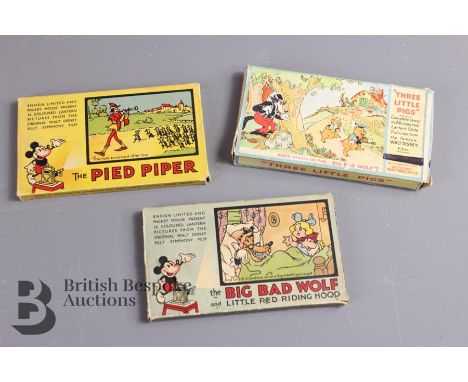 Three Walt Disney coloured lantern slides in original boxes with story inserts including Three Little Pigs 24 coloured lanter