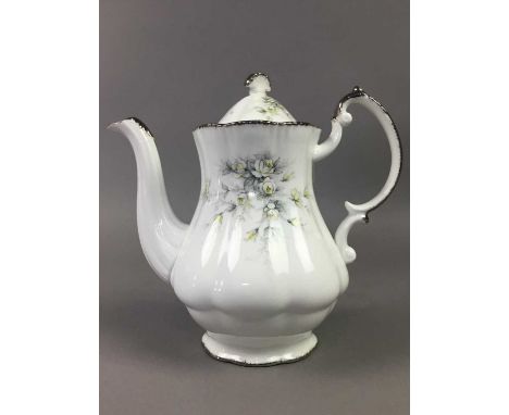 PARAGON 'FIRST LOVE' DINNER AND TEA SERVICE,including eleven tea cups, saucers and side plates, a tea pot, two sugar and crea