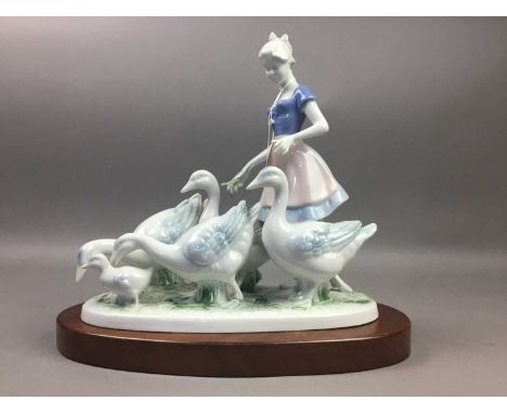 GROUP OF CERAMIC FIGURES,including Nao and Beswick, also a girl with geese, 30cm high (9)