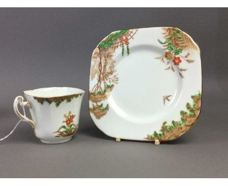 WOODLAND DELPHINE CHINA ART DECO PART TEA SERVICE,comprising eleven cups, two sandwich plates, eleven side plates, eleven sau