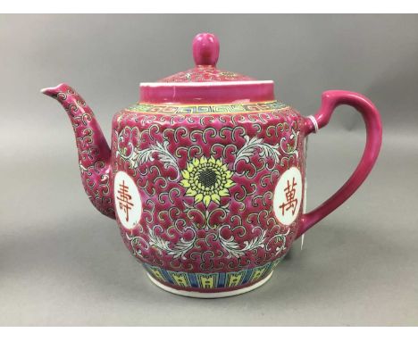 CHINESE TEA POT,16cm high, along with a pair of carved bamboo spill vases, a 19th century blue and white miniature vase, a te