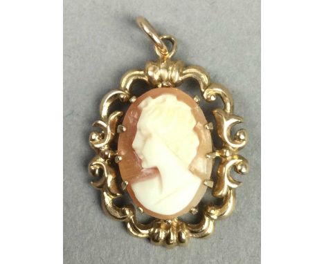 GOLD CAMEO PENDANT ON CHAIN,along with a pair of earrings to match, a gold dress ring and another pendant