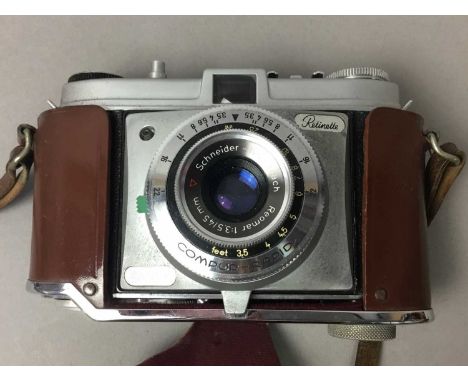 KODAK RETINETTE CAMERA,in fitted carry case, along with a Gossen Colour Finder and two cased sets of boot brushes (4)