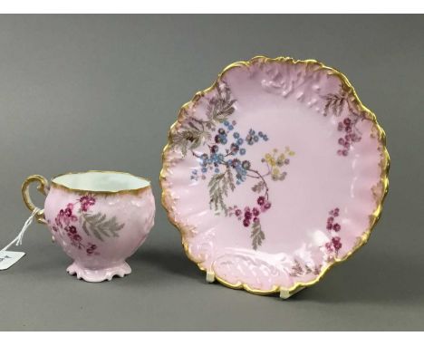 LIMOGES PART TEA SERVICE,with floral and gilt decoration on a pink ground, comprising six cups, six saucers and six side plat