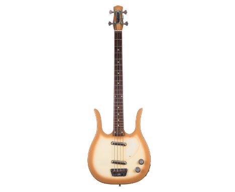 Dynelectron long horn bass guitar, made in Italy; Finish: gold burst, various blemishes to the edges; Fretboard: rosewood; Fr