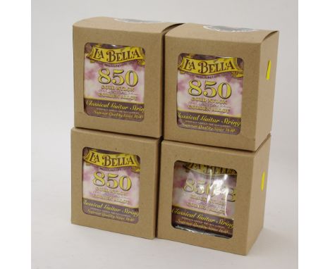 Thirty-three packets of new La Bella 850 gold nylon Golden Alloy classical guitar strings; together with five packets of La B