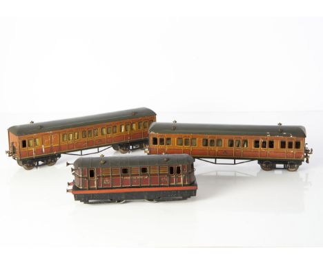 A Hornby 0 Gauge clockwork 'Metropolitan Electric' Locomotive and Coaches, a later example with No. 2 special mechanism, F-G,