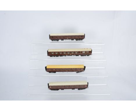 Rake of 00 Gauge kitbuilt GWR pre-grouping maroon Coaches, 12-wheel Restaurant Car, two Corridor Coaches and Third/First/Brak